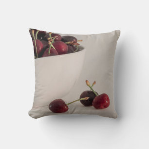Coussin Fruits de cerise dans un bol dans des tons feutrés