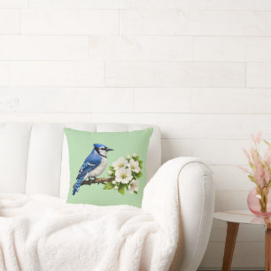 Coussin Geai bleu avec des fleurs blanches