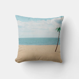 Coussin Green artificial palm tree on seashore