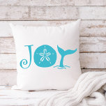 Coussin Happy Seashore | Beach Christmas Joy<br><div class="desc">Beach theme Christmas "Joy" pillow features tropical turquoise typography with a sand dollar seashell and whale tail. Perfect for beach and sea lovers and nautical,  coastal and ocean themes. L'Original artwork KL Stock.</div>
