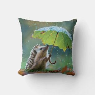 Coussin Hérisson mignon tenant un parapluie de feuilles