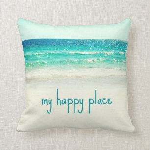 Coussin heureux de mot d'endroit de plage