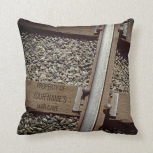 Coussin Homme-Caverne personnalisable de voie ferrée