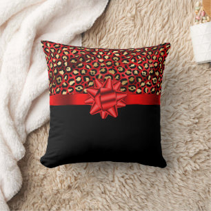 Coussin Impression léopard rouge, or et noir avec un nœud 