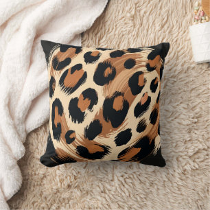 Coussin Imprimé animalier léopard peint en noir marron crè
