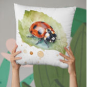Coussin Jardin artistique de coccinelle à l'aquarelle vibr