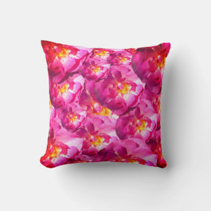 Coussin jeté aux roses roses