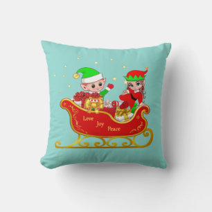 Coussin Joli elfe sur traîneau de Noël sur fond sarcelle