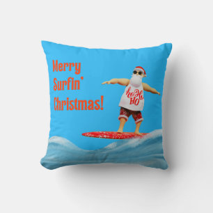 Coussin Joyeux Noël de surf Santa sur son surfboard