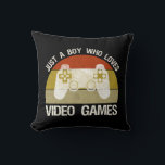 Coussin Just A Boy Who Loves Video Games<br><div class="desc">Just A Boy Who Loves Video Games. This funny gamer accessory is a great gift for a man, boy, teens & kids who love playing video games & computer games. If you're a geek and love console games & computer gaming, this design is for you! Includes a graphic of a...</div>