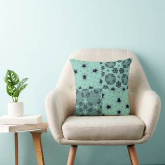 Coussin Kaléidoscope floral à la menthe et au noir