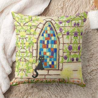 Coussin Kitty dans une fenêtre