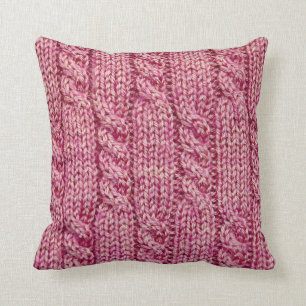 Coussin Knit câblé par fil rose