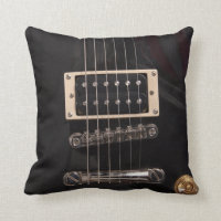 La guitare électrique noire élégante ficelle le