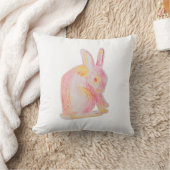 Coussin Lapin mignon à main rose (Couverture)
