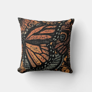Coussin L'art de l'imaginaire aux papillons orange et noir