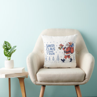 Coussin Le Père Noël arrive en ville