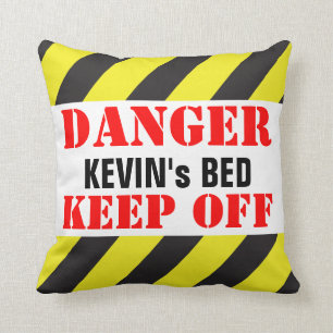 Coussin Le signe de danger d'enfants appelé retiennent le