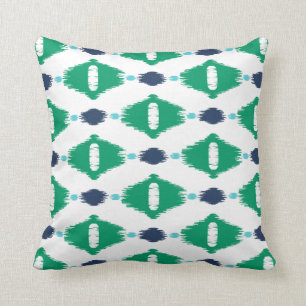 Coussin Le vert géométrique audacieux et l'ikat tribal de