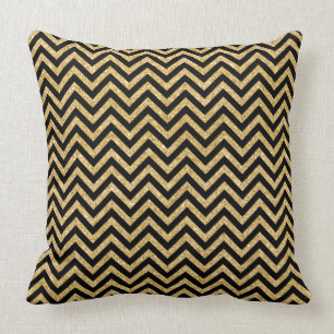 Coussin Le zigzag noir de parties scintillantes d'or barre
