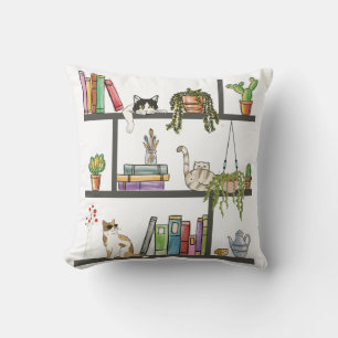Coussin Les chats qui reposent sur une étagère, un chat et