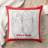 Coussin Les chaussures de bébé (Couverture)
