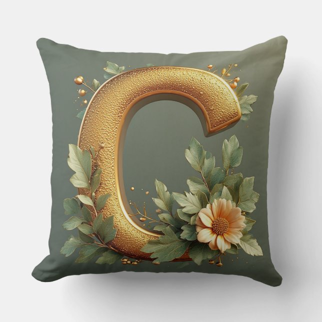 Coussin Lettre C dorée entourée d'arrangements floraux (Recto)