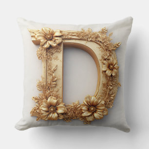 Coussin Lettre D dorée élégante avec des fleurs délicates