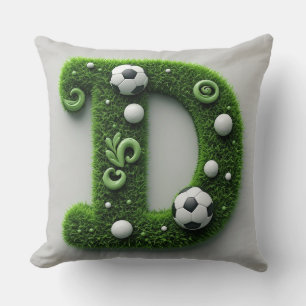 Coussin Lettre D en topiaire d'herbe verte avec ballon de