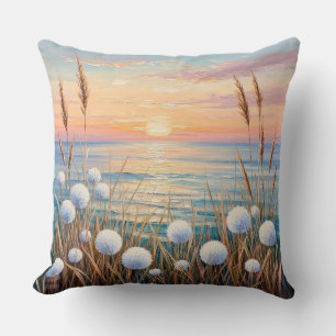 Coussin Lever de soleil idyllique sur l'océan avec des her