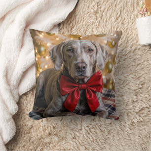 Coussin Lévrier de Weimar de Noël avec un nœud rouge