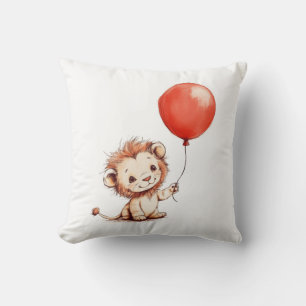 Coussin Lion bébé joueuse avec ballon rouge