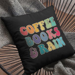 Coussin Livres à café et pluie<br><div class="desc">Livres, café et coussin de pluie : c'est la combinaison parfaite pour les amateurs de livres et les accros du café.</div>