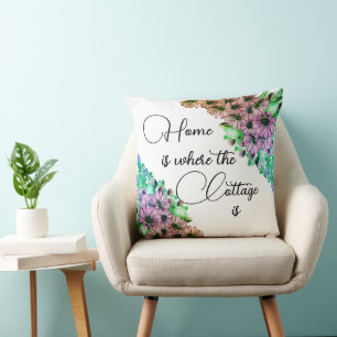 Coussin Maison Florale colorée où se trouve le chalet