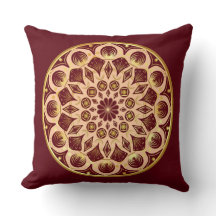 Mandala bordeauxrouge or sur fond bordeauxrouge