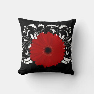 Coussin Marguerite rouge lumineuse de Gerbera sur le noir