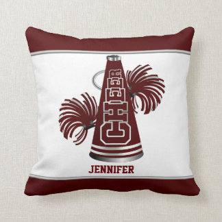 Coussin marron et blanc de pom-pom girl de