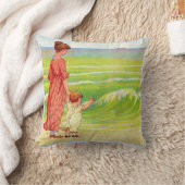 Coussin mère et bébé sur la plage (Couverture)