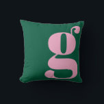 Coussin Modern Monogram Initial Letter Preppy Pink Green<br><div class="desc">This preppy monogram pillow features an oversized lowercase initial in pink against a deep green background. The bold, modern letterform adds personality and charm to teen rooms, dorms, and cozy spaces. Its clean, stylish look makes it easy to mix with colorful decor or classic prep accents. A fun, expressive design...</div>