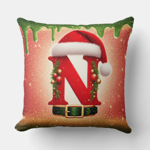 Coussin Monogramme de Noël cosy N avec chapeau de Père Noë
