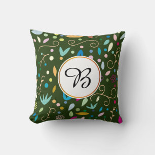 Coussin monogramme et feuille