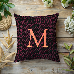 Coussin Monogramme Pétales violets sur noir