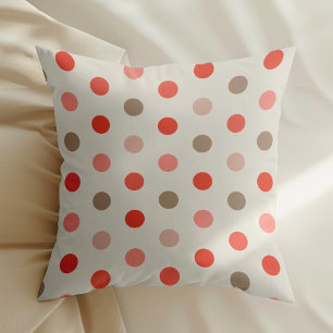 Coussin Motif à pois géométriques en tons rouges et roses