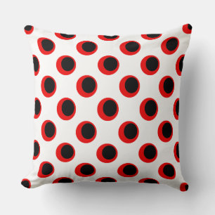 Coussin Motif à pois noirs et rouges