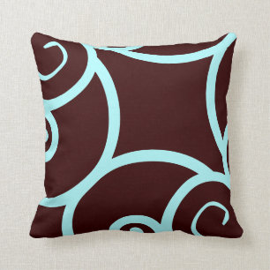 coussin motif abstrait turquoise et brun