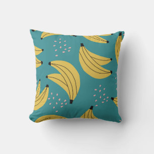 Coussin motif banane vintage, arrière - plan bleu.