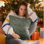 Coussin Motif botanique d'hiver vert<br><div class="desc">Un coussin à thème de Noël sympa et amusant avec une illustration dessinée à la main des botaniques d'hiver.</div>