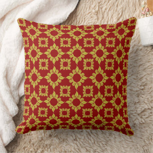 Coussin Motif damassé doré royal sur fond rouge foncé