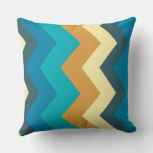 Coussin motif de chevron bleu, turquoise, jaune et turquoi