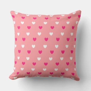 Coussin Motif de cœur rouge et blanc sur fond rose corail